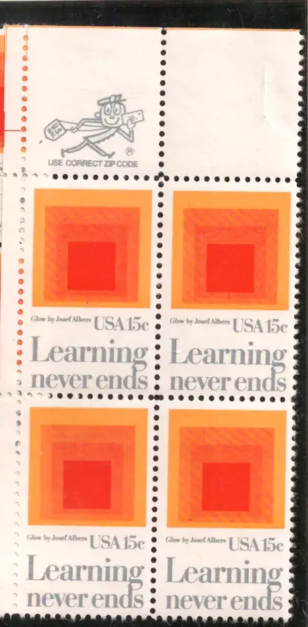 Learning Never Ends – block of four with upper ZIP selvage