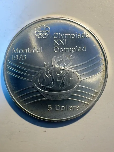5 долара „Олимпийски игри Монреал 1976 – Олимпийски огън“